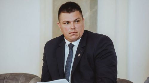 Прадстаўнік арганізацыі «BELPOL» Уладзімір Жыгар прэзентуе даклад пра ўдзел рэжыму Лукашэнкі ў вайне супраць Украіны ў межах IV Канферэнцыі беларусаў і беларусак свету. Варшава, Польшча. 23 траўня 2025 года. Фота: Рауль Дзюк / Белсат