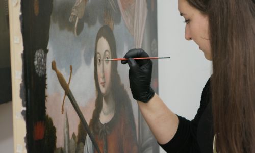 Restoration of paint layer defects. Workshop for Conservation and Restoration of Paintings on Movable Substrates II. Photo: Archive of WKiRDS of the Academy of Fine Arts in Warsaw.